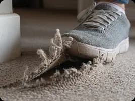 Torn carpeting